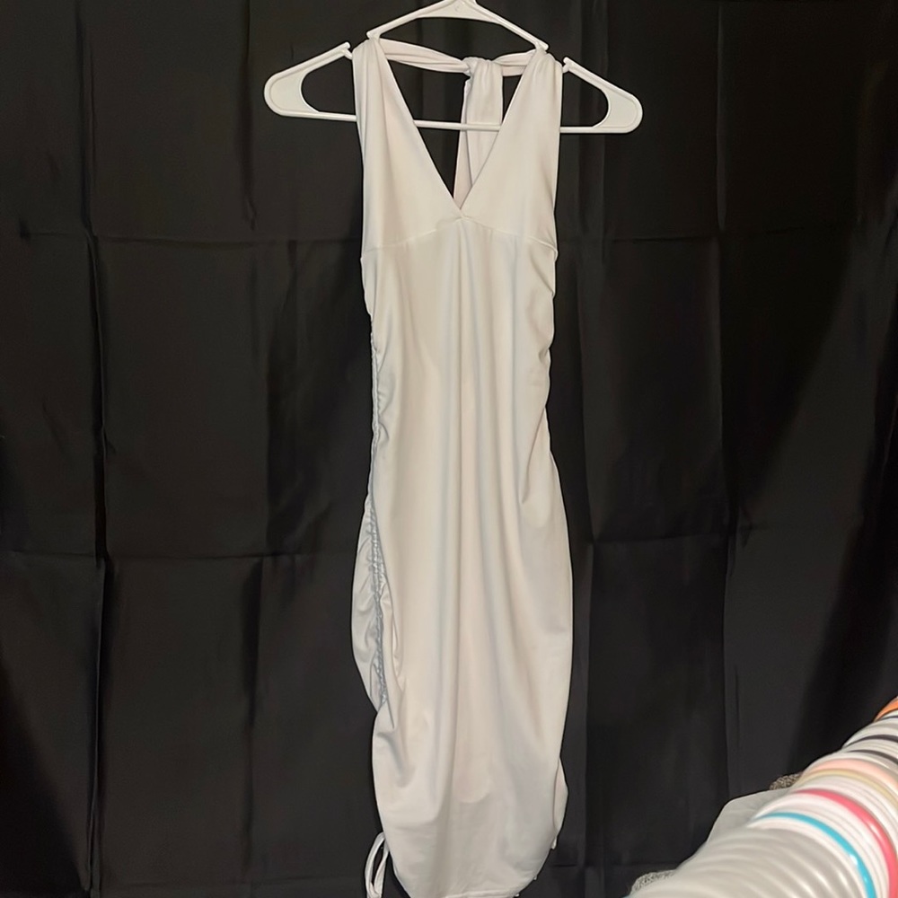 Halter top, blackless, tight white dress, scrunched butt and sided